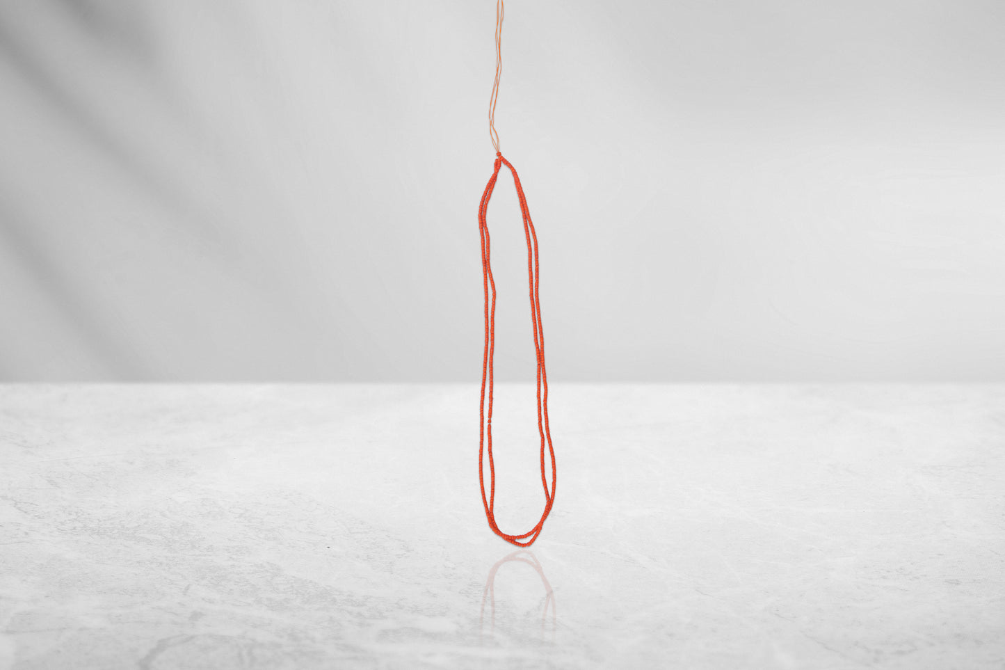 Kanthi (Orange, 11 Inch, 1 mm beads)