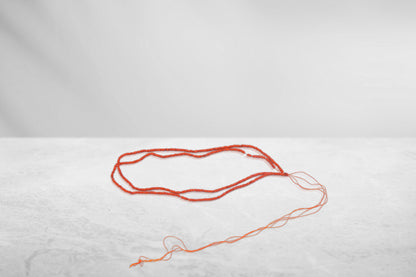 Kanthi (Orange, 8 Inch, 1 mm beads)